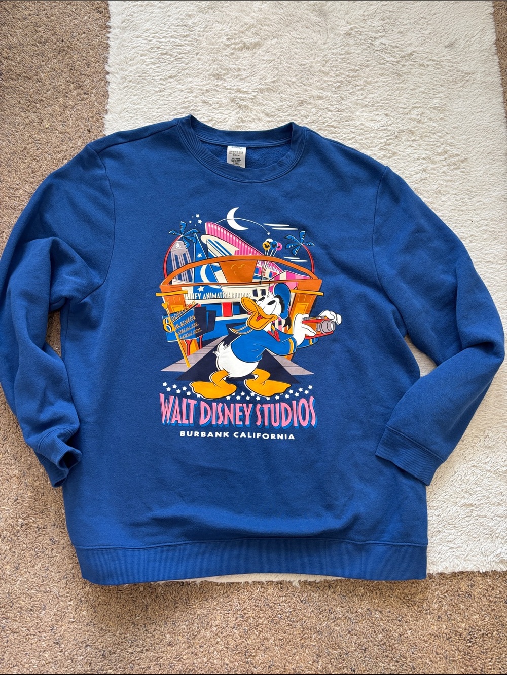 Disney Blue Walt Disney Studios Donald Duck Crewneck Sweatshirt